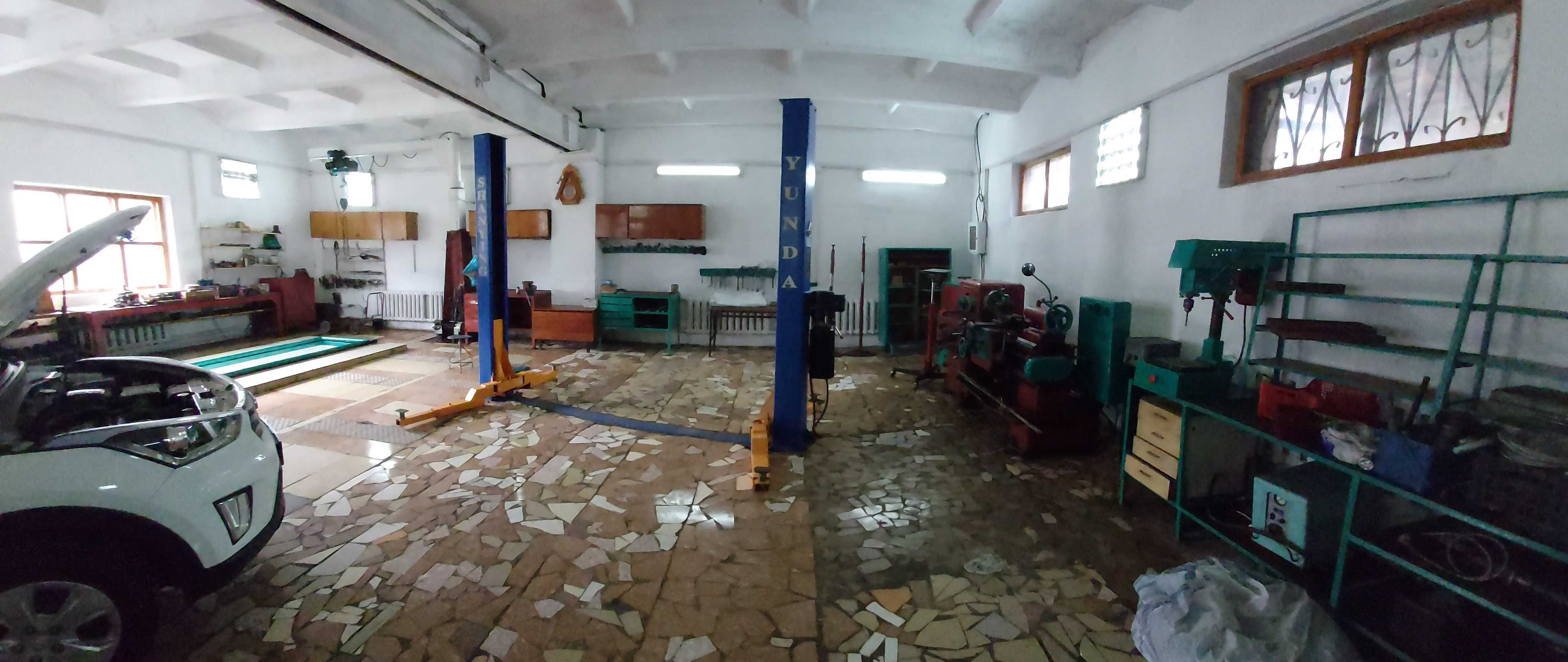 Дом с оборудованным СТО