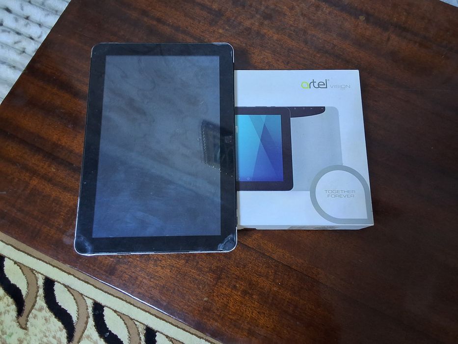 Планшет артель vision