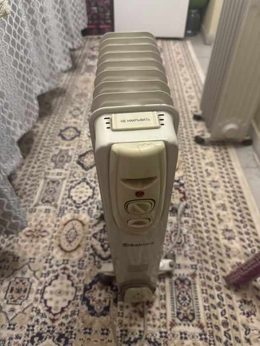 Масляный обогреватель батарея электрическая